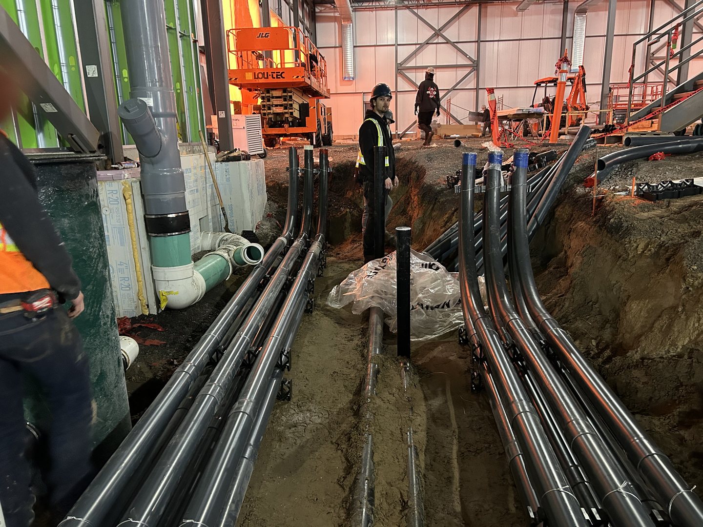 J.A.R. Electric crew installing underground electrical conduits